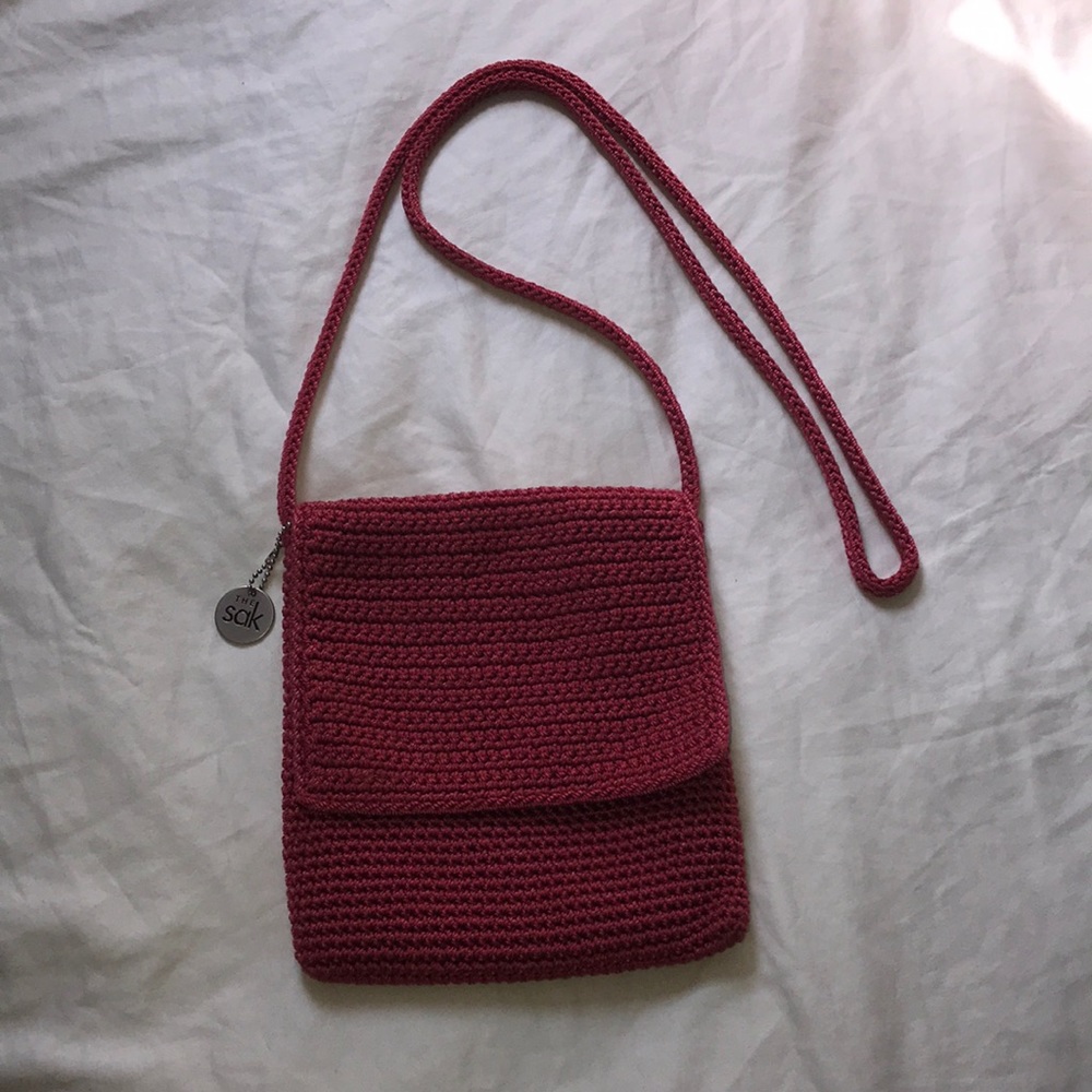 The Sak brand crossbody woven bag